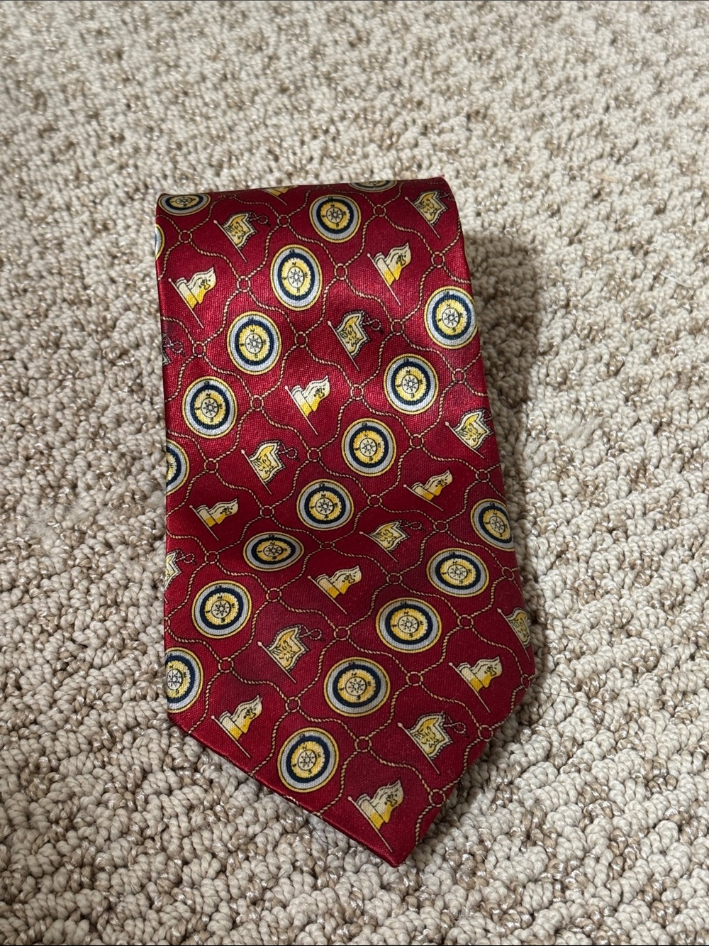 Men's Red Patterned Silk Tie with Gold and Navy Motifs